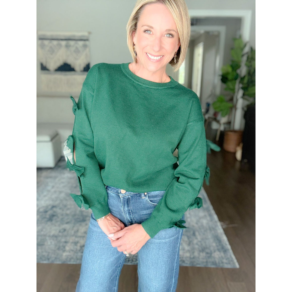 Women's boutique bow sweater hunter green front