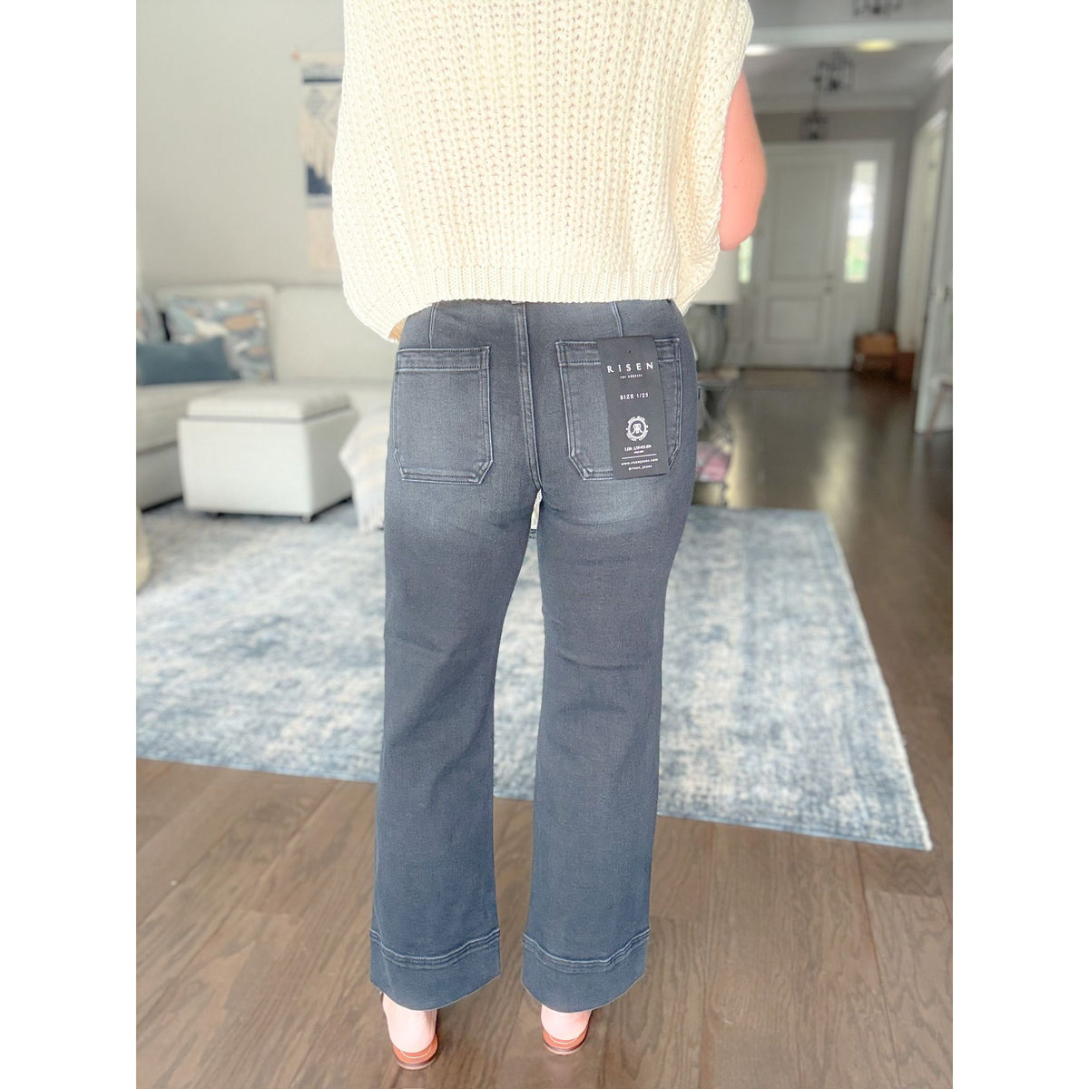 women's boutique black jeans back