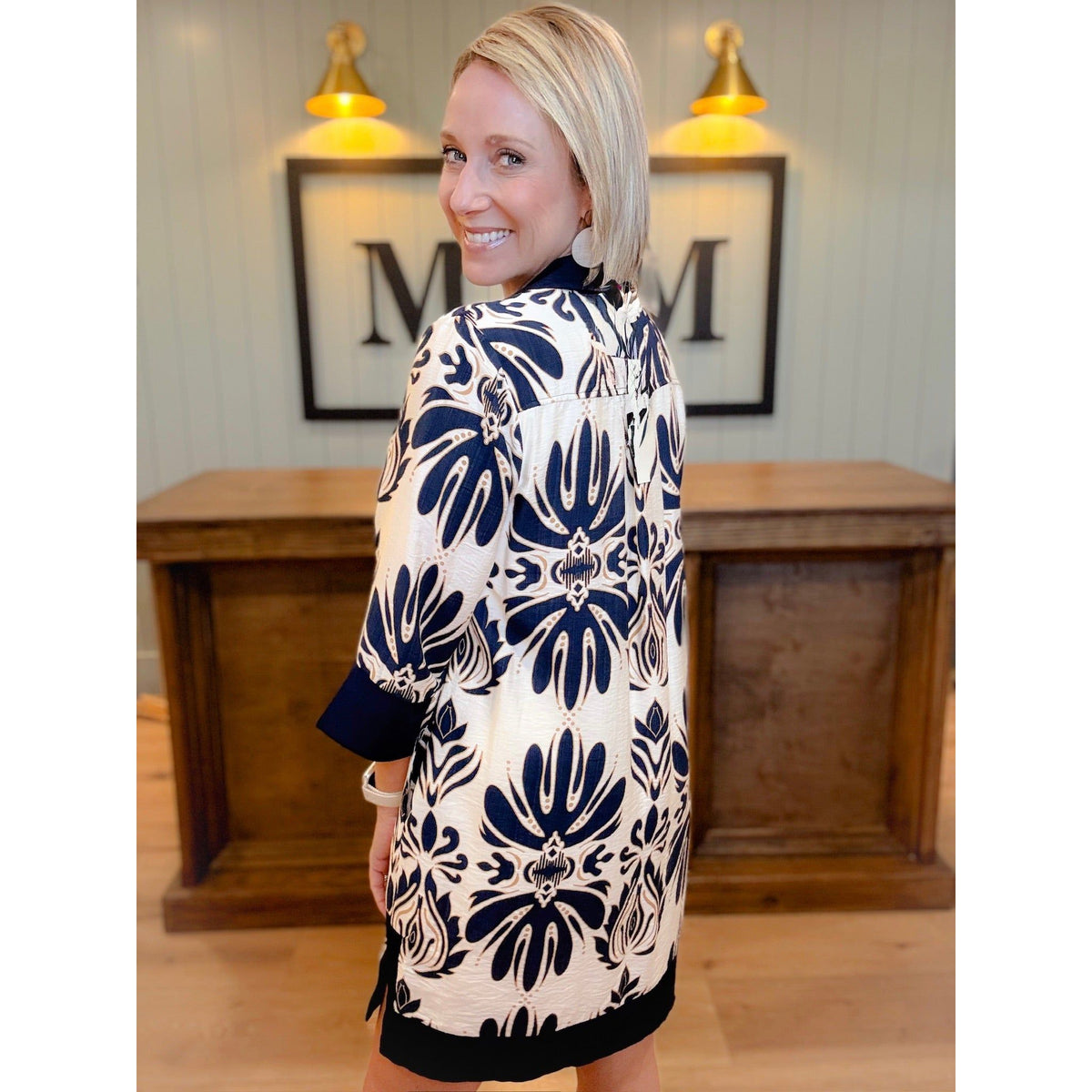 women's boutique dress three quarter sleeve button back