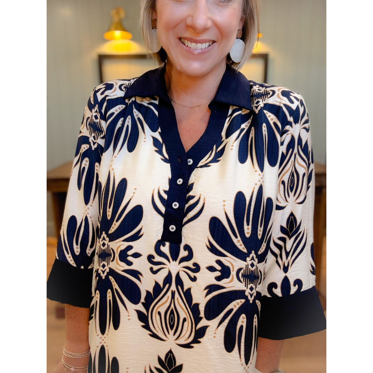 women's boutique dress three quarter sleeve button detail