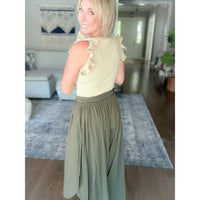 Women's boutique flowy green pants back