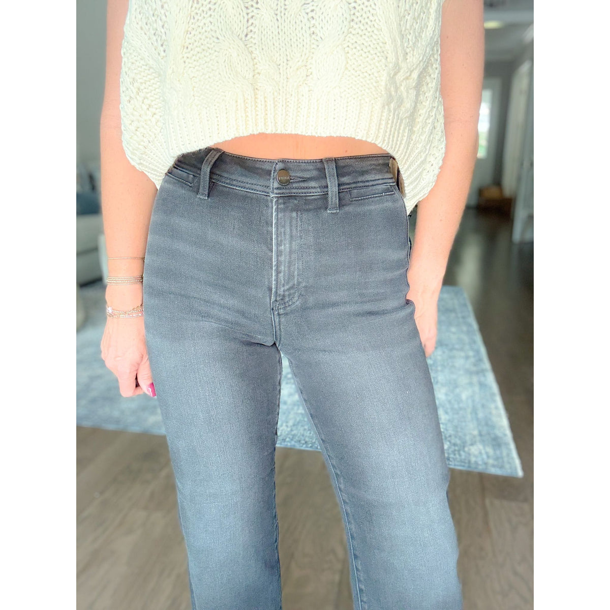 women's boutique black jeans front detail