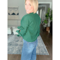 Women's boutique bow sweater hunter green back