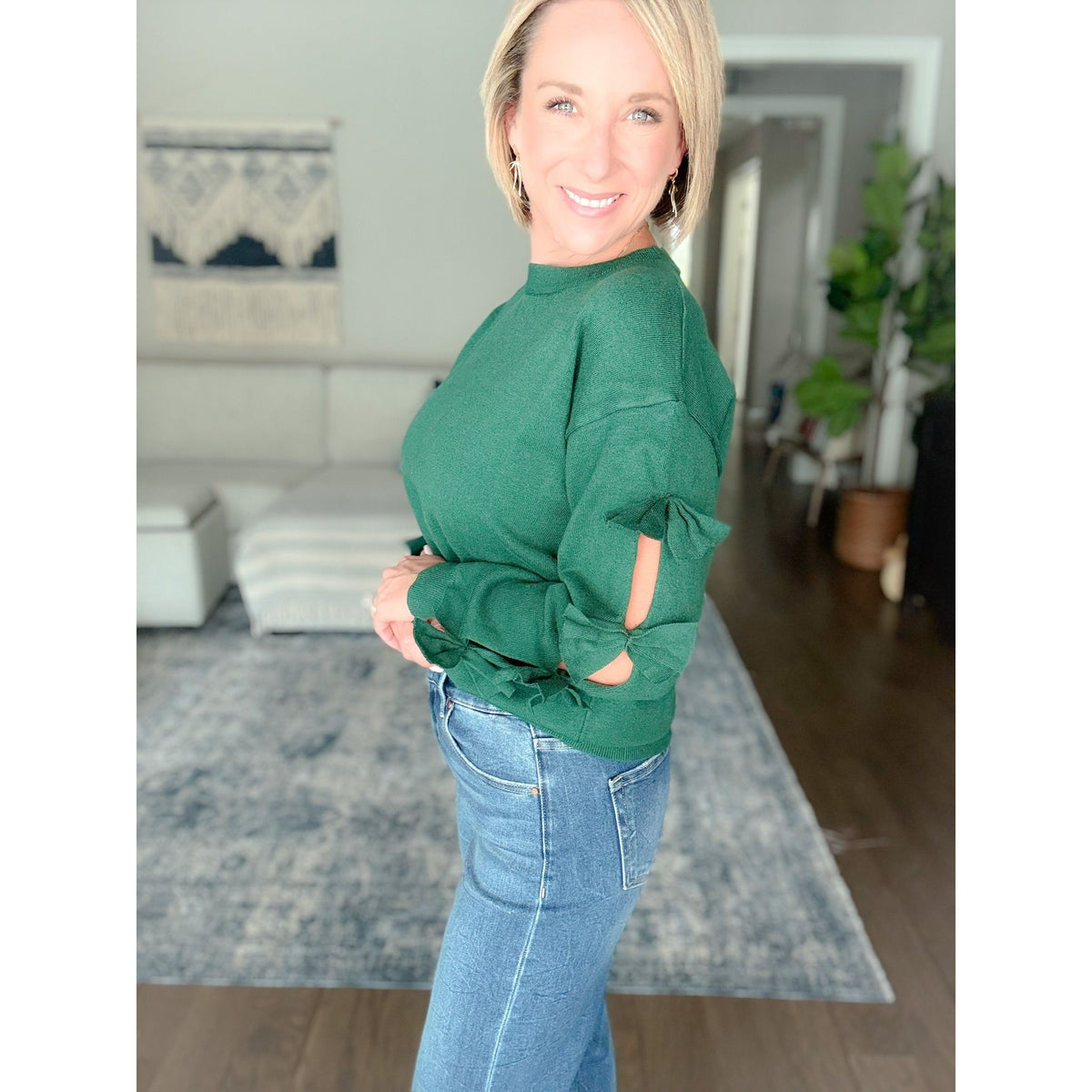 Women's boutique bow sweater hunter green size view