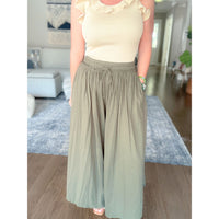 Women's boutique flowy green pants 